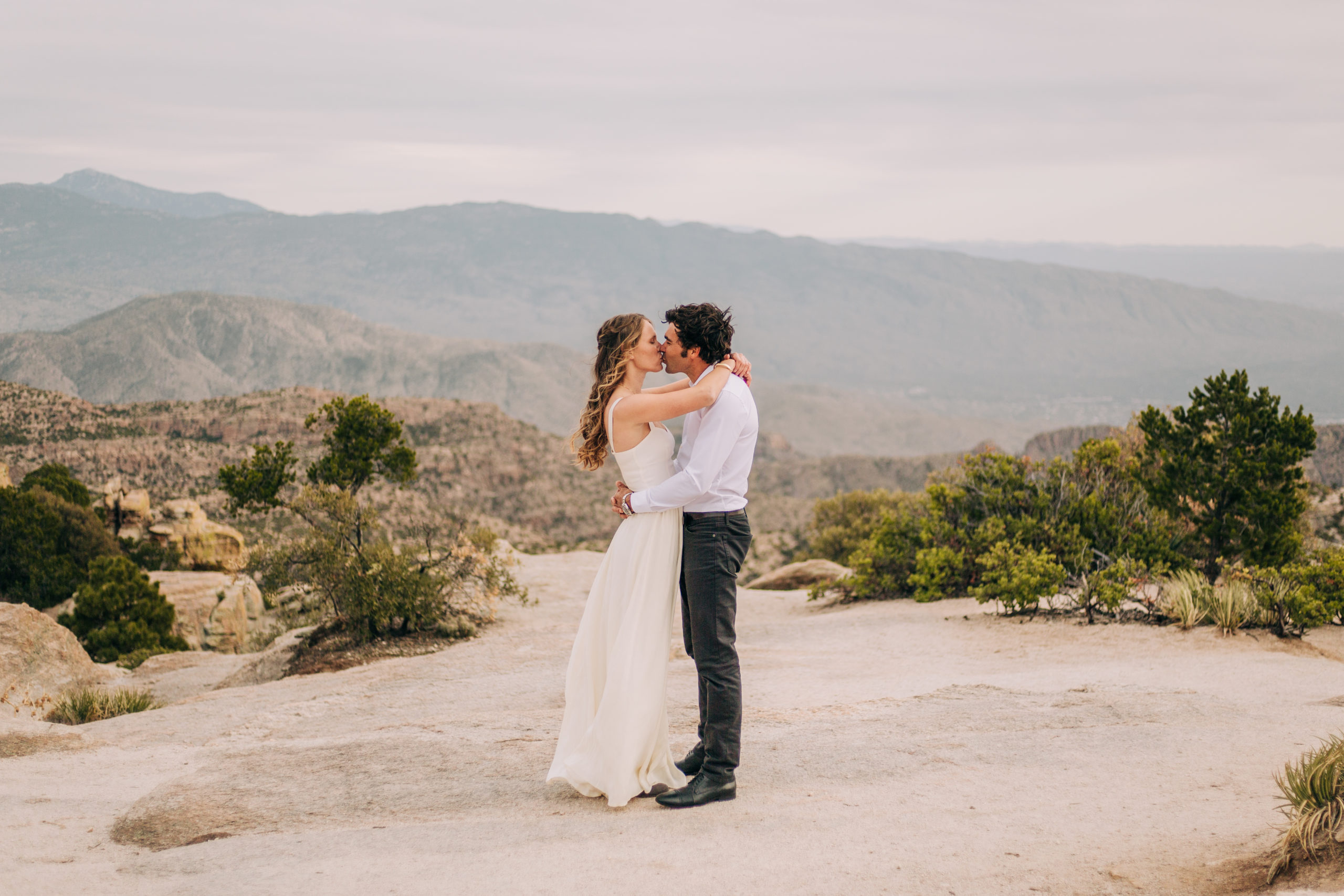 Windy-Point-Elopement—Mount-Lemmon-Elopement—Tucson-Elopement-Photographer—Tucson-Wedding-Photographer—Mount-Lemmon-Wedding—Adventure-Elopement—Bride-And-Groom—Mountain-Scenery—Portraits—Embrace—